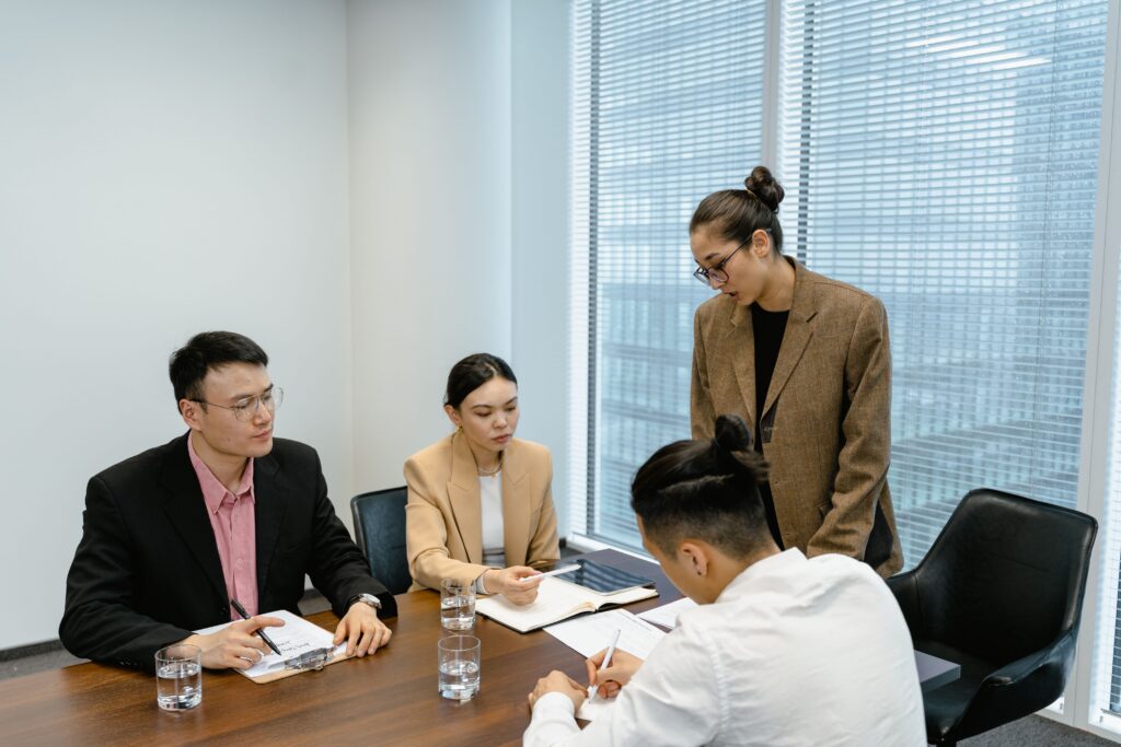 Woman speaking in a meeting.